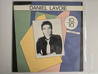 Front cover of Daniel Lavoie 10-10 Compilation LP in plastic sleeve