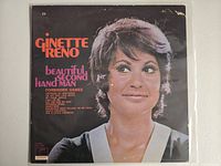 Front album cover showing Ginette Reno portrait and title