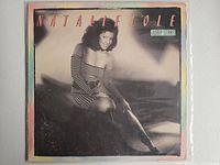 Front cover with artist image and title