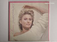 Front jacket showing artist portrait and title