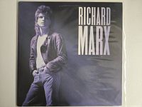 Front jacket showing artist portrait and title