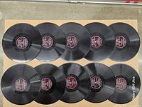 Top view of all ten records showing labels and playing surfaces
