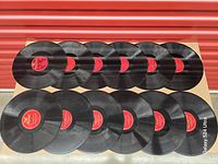 Top view of all 12 records showing labels and surfaces