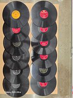 All 12 records laid out label side up