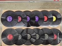 Top view of all 12 records showing labels and surfaces