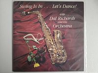 Front album jacket with saxophone image and title text