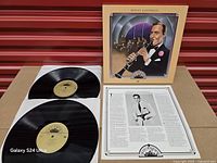 Set overview showing box cover, two records, insert