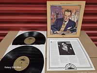 Front cover, both records, and insert displayed