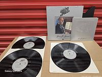 Box set front with portrait cover and three records