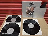 Overview of three records and slipcase