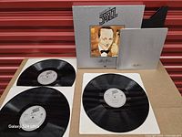 Set with three records, slipcase, inner sleeve displayed