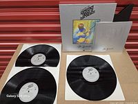 Full set: three records, box, booklet