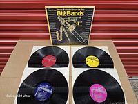 Box front with four LPs displayed