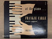 Front of album binder with graphics and title