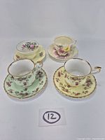 All four teacup and saucer sets overview