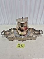 Front view of full set showing tray, pot, six cup holders