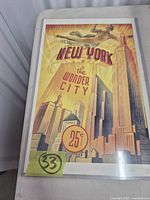 Full view of poster in plastic sleeve