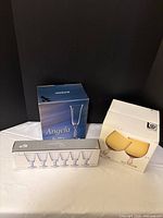 Three original boxes for each glassware set