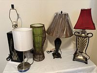 Group shot of all five lamps displaying variety of bases and shades
