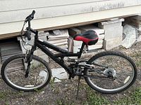 Full side view of black Next PX 4.0 mountain bike