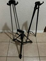 Three tripods displayed upright showing sizes and colors