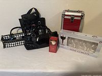 All items grouped: three wine bags, red wine carrier, boxed goblets, boxed stopper