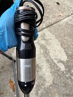 Full view of HOMIEE immersion blender showing handle and cord