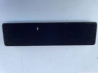 Closed black rectangular bracelet box