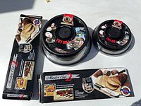 Two Master Cut 2 cutter set boxes and two PressDome lids