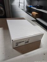 Sealed white retail box containing the ADT touchscreen panel