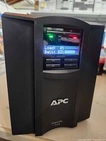 Front view showing APC logo and LCD screen