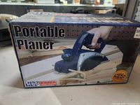 Retail box showing HDC Portable Planer branding