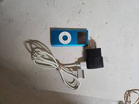 iPod Nano with cable and charger