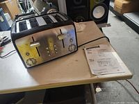 Front view showing brand, controls and buttons