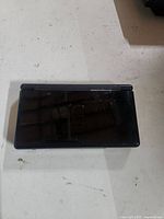 Console closed showing top shell surface