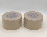 Two tan packing tape rolls side by side