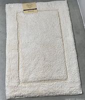 Full view of light yellow Alkaso bathmat
