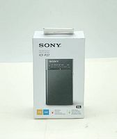 Front of retail box showing Sony ICF-P27 radio image and feature icons