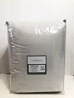Front of sealed Threshold king comforter set package showing label and texture