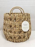 Front of Threshold woven basket with tag visible