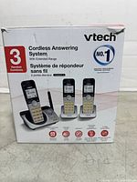 Front of retail box showing VTech CS5229-3, three-handset cordless answering system