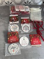 Overview of boxed ornaments, ribbons and gift bags