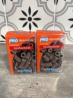 Front view of two Medicool Pro Bands boxes showing sanding bands inside