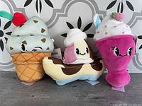 All three ice cream plush toys grouped together