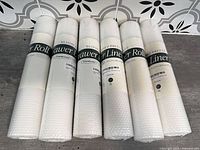 Six sealed rolls of Bloom & Breeze drawer liner