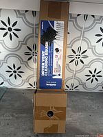 Front view of boxed Holikme dryer vent cleaning brush kit