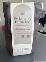 Front of package displaying brand, size, material, thread count