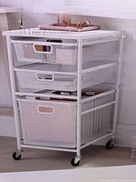 Front of box showing assembled white metal 3-drawer file cart