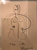 Close-up of artwork showing figure