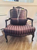 Front view of armchair with cushions